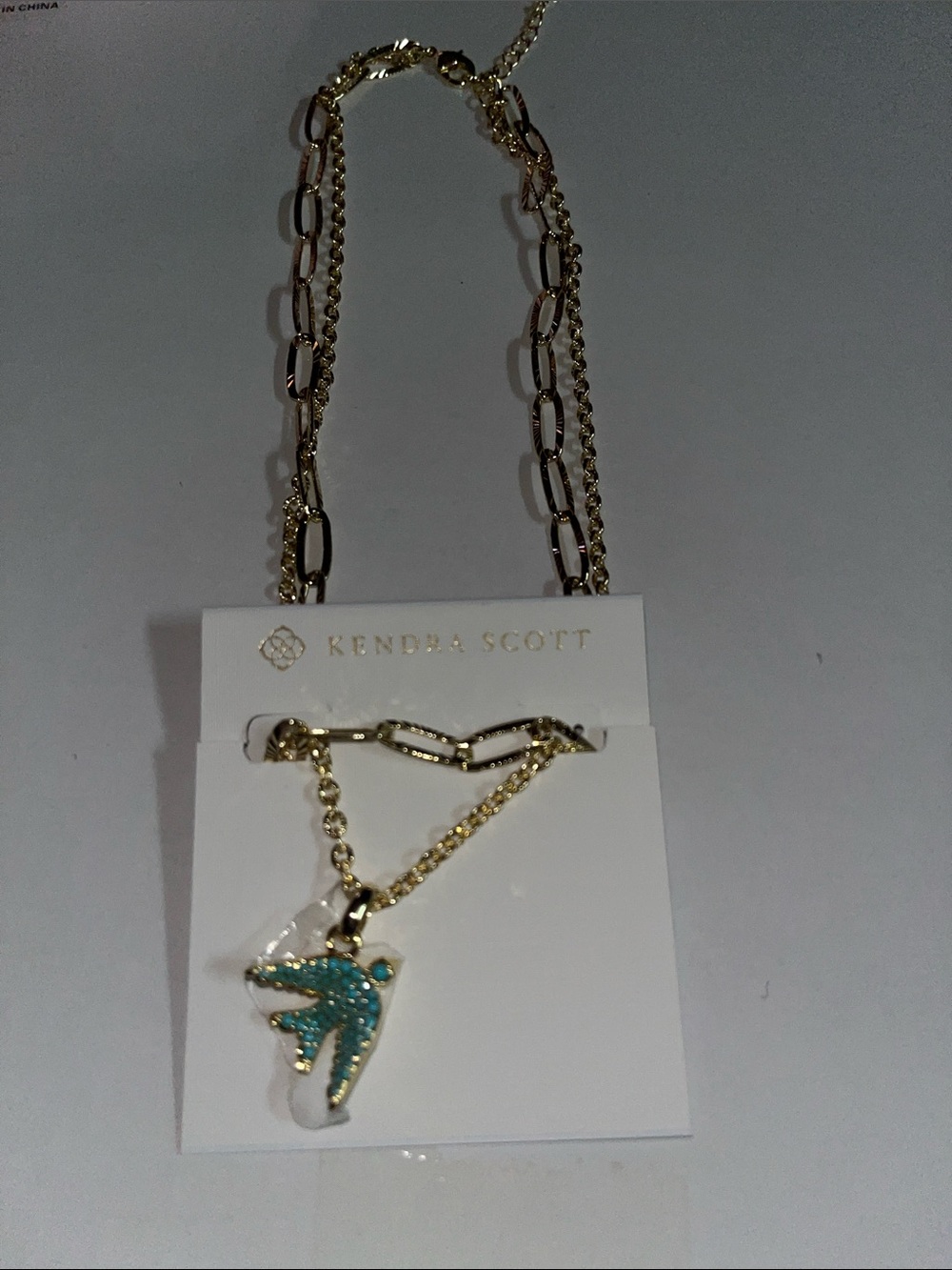 Kendra Scott Gold Necklace with Turquoise Blue Bird Pendant